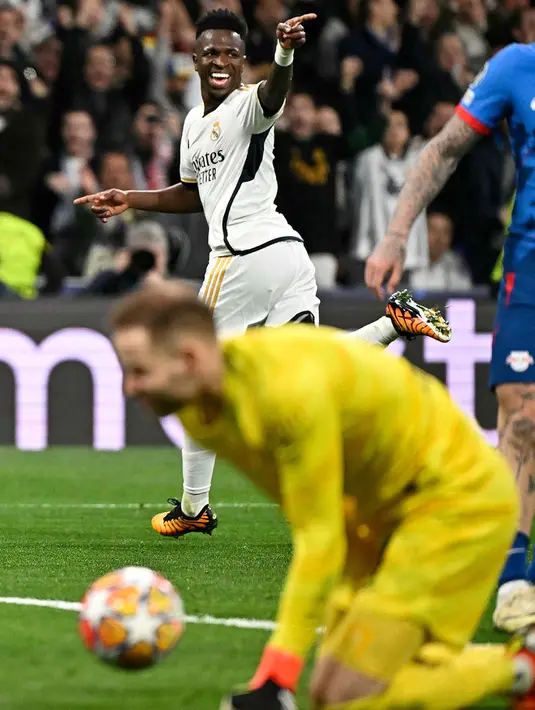 <p>Real Madrid unggul lebih dulu lewat gol yang dicetak Vinicius Jr pada menit ke-65. (JAVIER SORIANO/AFP)</p>
