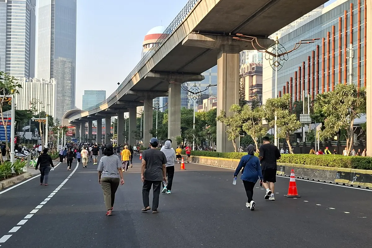 Suasana Hari Bebas Kendaraan Bermotor (HBKB) atau Car Free Day (CFD) di Jalan HR Rasuna Said, Jakarta Selatan, Minggu (7/6/2026).
