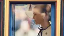 Kate Middleton terlihat ikut dalam iring-iringan kereta kuda menuju The Mall. (BENJAMIN CREMEL / AFP)