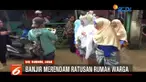 Banjir masih melanda sejumlah wilayah Jawa Barat. Namun banjir yang merendam tidak menyurutkan warga Dayeuhkolot untuk menggelar resepsi pernikahan.