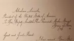 Sepucuk surat yang ditulis Presiden AS Abraham Lincoln pada tahun 1862 untuk Raja Mongkut dari Thailand dipamerkan Kedutaan Besar AS di Bangkok, 22 Maret 2018. Surat itu untuk menolak tawaran pemberian sepasang gajah sebagai hadiah. (AP/Sakchai Lalit)