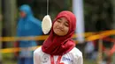 Salah satu peserta lomba makan kerupuk bersiap tampil memeriahkan HUT RI ke-69 di kawasan Tugu Monas, Jakarta, (31/8/2014). (Liputan6.com/Helmi Fithriansyah)