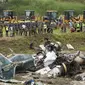 Kecelakaan pesawat jatuh di Kathmandu, Nepal, Rabu 24 Juli 2024. (AP)