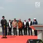 Presiden Joko Widodo (Jokowi) memberikan sambutan saat meresmikan empat ruas tol di Provinsi Jawa Timur, Kamis (20/12). Empat ruas tol sepanjang 59 km ini merupakan bagian dari Jalan Tol Trans-Jawa. (Liputan6.com/Angga Yuniar)