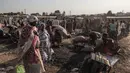 Aktivitas warga di pasar lokal Kota Asosa, Ethiopia, Rabu (25/12/2019). (EDUARDO SOTERAS/AFP)