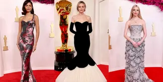 Karpet merah tidak pernah lengkap sampai Zendaya tiba. Untuk Oscar 2024, aktris itu terlihat luar biasa dalam gaun korset satu bahu dengan detail bunga dari Armani Priv&eacute; , yanh dipermanis dengan perhiasan Bulgari. [@stillmagg]