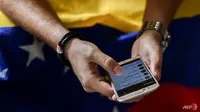Jaringan internet dan situs pemerintah lumpuh akibat serangan siber di Venezuela (AFP)