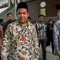 Wakil Ketua DPR RI Fahri Hamzah (peci hitam) berjalan keluar ruang sidang Pengadilan Negeri Jakarta Selatan, Selasa (3/5). Seperti diketahui, Fahri menggugat tiga pihak di PKS terkait pemecatannya dari keanggotaan partai. (Liputan6.com/Yoppy Renato)