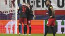 Reaksi kecewa para pemain RB Salzburg setelah menelan kekalahan 1-3 dari Benfica pada laga matchday keenam Grup D Liga Champions 2023/2024 di Red Bull Arena, Salzburg, Austria, Rabu (13/12/2023) dini hari WIB. (AP Photo/Matthias Schrader)