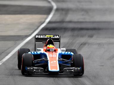 Pebalap Manor Racing asal Indonesia, Rio Haryanto, berhasil finis posisi ke-19 F1 GP Kanada di Sirkuit Gilles Villeneuve, Kanada, Senin (13/6/2016) dini hari WIB. Sementara itu Lewis Hamilton menjadi juara. (AFP/Getty Images/Mark Thompson)