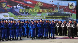 Pasukan mengikuti upacara HUT ke-69 Polisi Air dan Udara (Polairud) di Mako Polairud, Pondok Cabe, Tangerang, Banten, Rabu (4/12/2019). HUT bertema 'SDM Unggul dengan Almatsus Modern, Korpolairud Baharkam Polri Siap Menjaga Stabilitas Keamanan Dalam Negeri'. (Liputan6.com/Faizal Fanani)