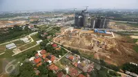 Suasana pembangunan kota baru berskala internasional di Kota Meikarta, Lippo Cikarang, Sabtu (13/05). Pembangunan kota tersebut telah menyerap ribuan tenaga kerja di Cikarang. (Liputan6.com/Fery Pradolo)