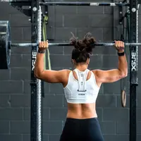 Ilustrasi orang sedang angkat beban. (Foto: Unsplash/John Arano)