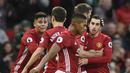 Para pemain Manchester United merayakan gol Henrikh Mkhitaryan (kanan) saat melawan Tottenham Hotspur pada lanjutan Premier League di Old Trafford, Manchester, (11/12/2016). (AFP/Oli Scarff)