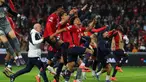 Para pemain Lille merayakan kemenangan setelah memenangkan laga matchday 2 League Phase Liga Champions 2024/2025 melawan Real Madrid di Stadion Pierre Mauroy, Villeneuve-d'Ascq, Prancis, pada Rabu 2 Oktober 2024 atau Kamis (3/10/2024) dini hari WIB. (FRANCK FIFE/AFP)