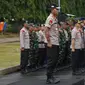 Kapolda Metro Jaya, Irjen Pol Idham Azis saat memimpin apel kesiapan pengamanan malam pergantian tahun di kawasan Silang Monas, Jakarta, Senin (31/12). Apel diikuti semua unsur pengamanan. (Liputan6.com/Helmi Fithriansyah)