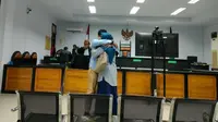 Salah satu terdakwa kasus korupsi BSG, usai menjalani persidangan di Pengadilan Tipidkor Gorontalo. (Dok. Istimewa) (Arfandi Ibrahim/Liputan6.com)