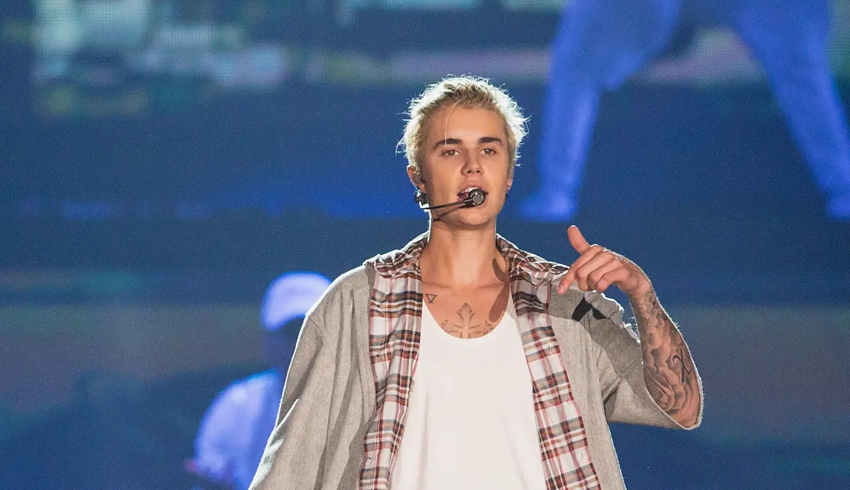 Mendapat tanggapan ramai dari penggemar harusnya menjadi kebanggan bagi sang idola. Namun sepertinya tidak untuk Justin Bieber, ia malah meminta penggemarnya untuk tidak bising di konsernya saat itu. (AFP/Bintang.com)