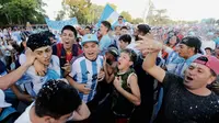 Fans Argentina siap menunggu para pahlawan juara Piala Dunia 2022 di Obelix, monumen tempat selebrasi di Buenos Aires (AFP)