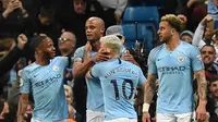 Para pemain Manchester City merayakan gol yang dicetak Vincent Kompany. (AFP/Oli Scarff)