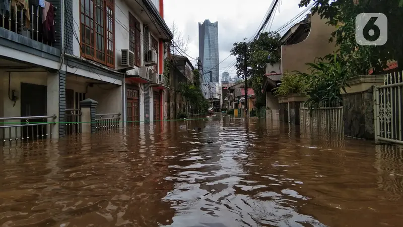 FOTO: Banjir Rendam Permukiman Warga di Kebalen