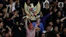Pendukung Timnas Indonesia bersorak merayakan kemenangan Garuda Muda saat laga Semifinal Piala AFF U-23 2025 melawan Thailand di Stadion Utama Gelora Bung Karno (SUGBK), Jakarta, Jumat (25/7/2025). (Liputan6.com/Helmi Fithriansyah)