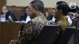 Mantan Menteri Agama, Lukman Hakim Saifuddin saat menjadi saksi pada sidang lanjutan dugaan suap jual-beli jabatan di lingkungan Kemenag dengan terdakwa M Romahurmuziy di Pengadilan Tipikor Jakarta, Rabu (4/12/2019). Sidang beragenda mendengar keterangan saksi. (Liputan6.com/Helmi Fithriansyah)