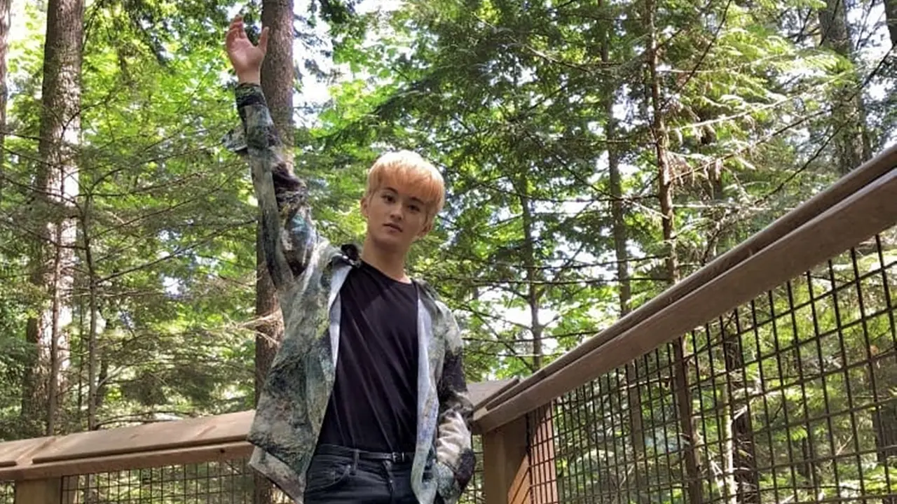 FOTO: Gaya Keren Mark Lee, Rapper NCT127 yang Hari Ini Genap 20 Tahun