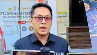 Kepala Seksi Humas Polresta Malang Kota, Ipda Lukman Sobhikin. (Liputan6.com/Hermawan Arifianto)