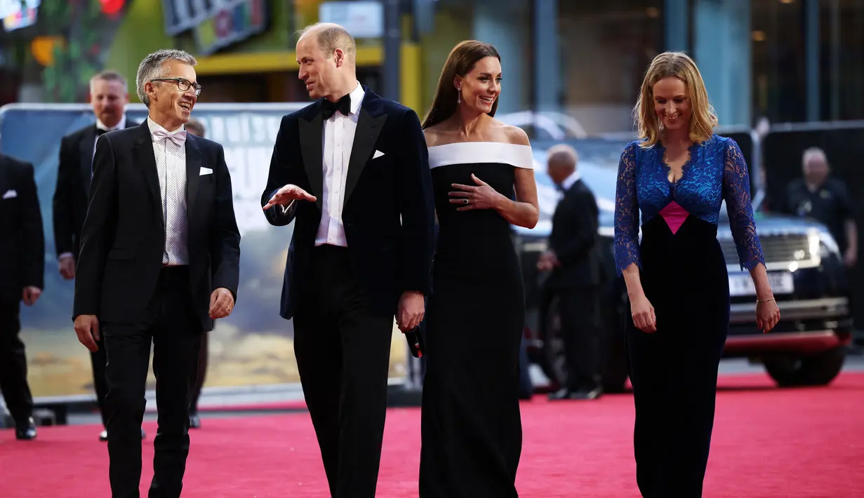 <p>Kate Middleton dan Pangeran William menghadiri penayangan perdana film Top Gun: Maverick yang dibintangi Tom Cruise di Leicester Square Gardens, London, pada 19 Mei 2022. (dok. Dan Kitwood / POOL / AFP).</p>