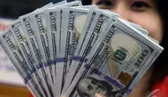 Nilai tukar rupiah terhadap dolar Amerika Serikat (AS) terus menguat, Jakarta, Kamis (23/10/2014) (Liputan6.com/Johan Tallo)