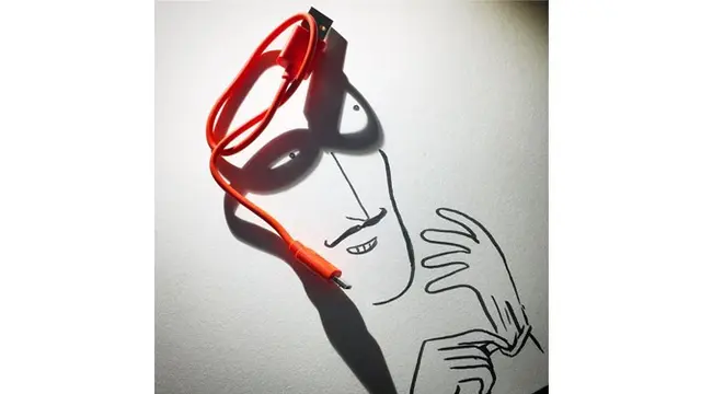 Sederhana, bayangan dari kabel menghasilkan ilustrasi topeng mata.