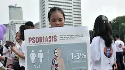 Mahasiswa dari Fakultas Kedokteran Universitas Indonesia (FKUI) menggelar kampanye tentang penyakit Psoriasis saat car free day di Jakarta, Minggu (4/11). Kampanye dilakukan dalam rangka memperingati World Psoriasis Day 2018 (Merdeka.com/Iqbal S. Nugroho)