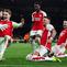 Pemain Arsenal David Raya, Martin Odegaard, Bukayo Saka, Ben White dan Declan Rice (kiri ke kanan melakukan selebrasi setelah memenangkan adu penalti pada pertandingan sepak bola leg kedua babak 16 besar Liga Champions melawan Porto FC di Emirates Stadium, London utara, 12 Maret 2024. (Adrian DENNIS/AFP)