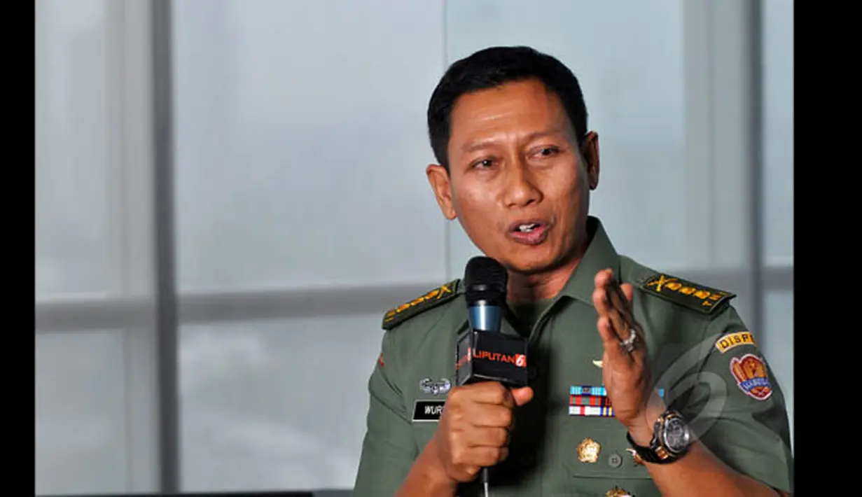 Kadispen AD Kolonel Inf. Wuryanto saat berkunjung ke redaksi Liputan6.com di SCTV Tower, Senayan, Jakarta, Selasa (20/1/2015). (Liputan6.com/Miftahul Hayat) 