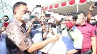 Gubernur Sulut Olly Dondokambey dalam sebuah kegiatan seremonial, Sabtu (1/5/2021).