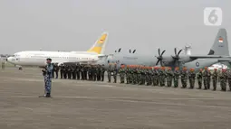 Komando Operasi Udara Nasional melaksanakan apel kesiapan pengamanan VVIP pelantikan presiden dan wakil presiden terpilih di Pangkalan Udara Halim Perdanakusuma, Jakarta. (Liputan6.com/Herman Zakharia)