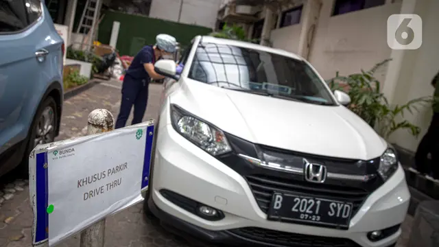 FOTO: Pemeriksaan Kesehatan Balita Secara Drive Thru