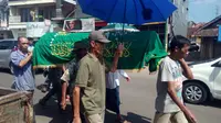 Seorang warga Garut meninggal dunia saat antre mencoblos (Liputan6.com/Jayadi Supriadin)