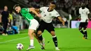 Di babak kedua, Die Mannschaft tampil dominan dan berusaha lebih tenang dalam penguasaan bola. (INA FASSBENDER/AFP)