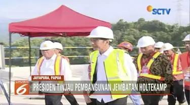 Jokowi meninjau perkembangan pembangunan Jembatan Holtekamp di Jayapura, jembatan sepanjang 732 meter  ini sudah 80 persen selesai dikerjakan.