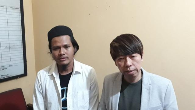 Fiqih Alamsyah bersama kuasa hukumnya, Henry Indraguna