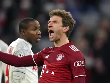 Reaksi pemain Bayern Munchen Thomas Mueller usai mencetak gol ke gawang Salzburg pada pertandingan leg kedua babak 16 besar Liga Champions di Munich, Jerman, 8 Maret 2022. Bayern Munchen menang 7-1. (AP Photo/Matthias Schrader)