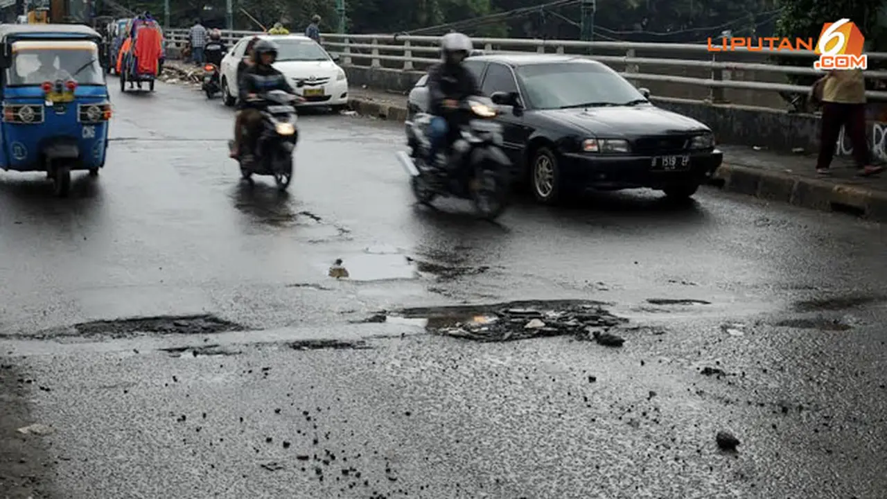jalan-rusak-140208b.jpg