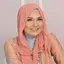 Ria Miranda adalah desainer asal Indonesia