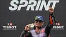 Pembalap Prima Pramac Racing asal Spanyol, Jorge Martin melakukan selebrasi setelah memenangkan balapan Sprint MotoGP Grand Prix Malaysia di Sirkuit Internasional Sepang, 2 November 2024. (Lillian SUWANRUMPHA/AFP)
