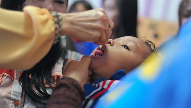 Program imunisasi anak yang dilakukan di berbagai Sekolah Dasar (SD) di Sumsel (Liputan6.com / Nefri Inge)