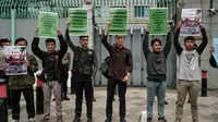 Aksi unjuk rasa digelar sebagai bentuk keprihatinan dan penolakan penggusuran masyarakat Pulau Rempang, Batam. (Yasuyoshi CHIBA/AFP)