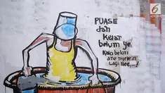Sebuah gang di Jagakarsa, Jakarta Selatan dihiasi dengan mural Islami untuk mewarnai bulan Ramadan.