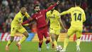 <p>Rapatnya barisan pertahanan Villarreal membuat para pemain Liverpool kesulitan untuk menembusnya. The Reds pun dibuat cukup frustrasi akan situasi tersebut. (AP/Jon Super)</p>